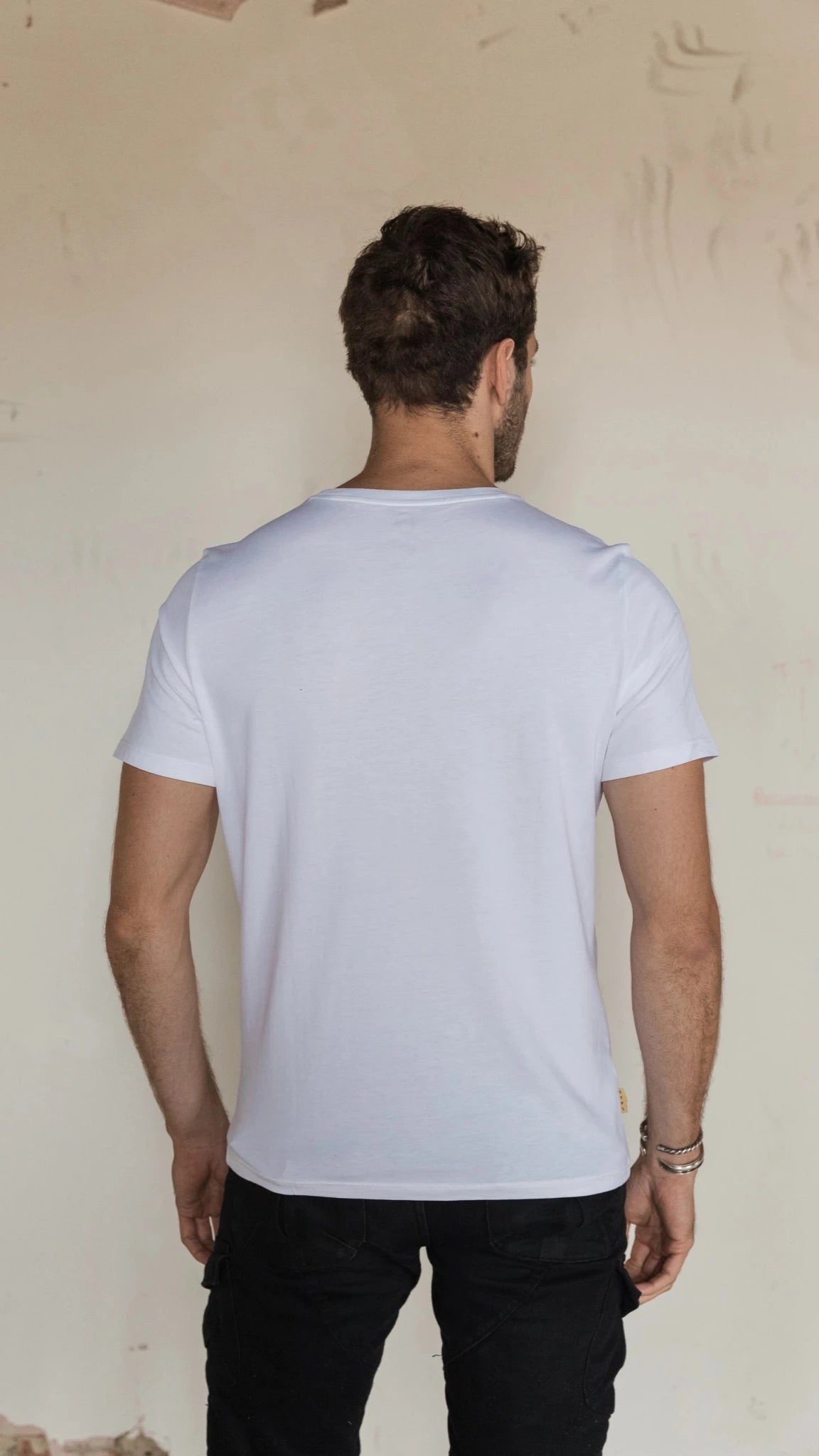 STPL white Pima cotton V-neck t-shirt – ethically made, ultra-soft fabric with a comfortable fit, perfect for versatile, everyday style